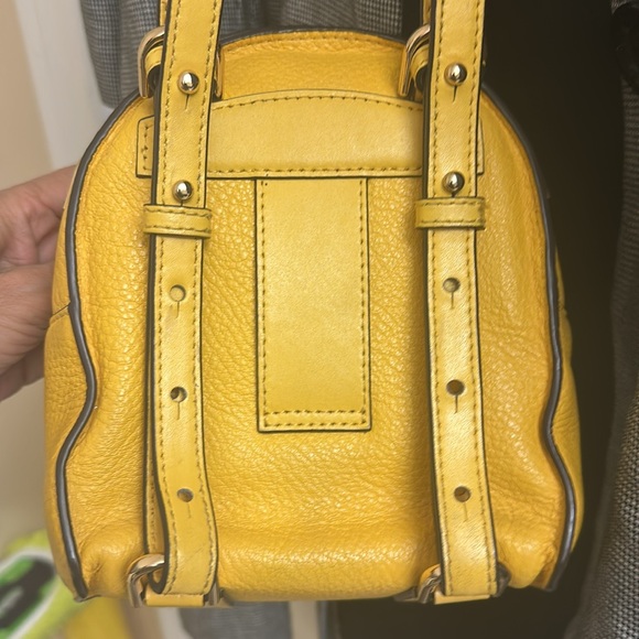 MICHAEL KORS YELLOW MINI BACKPACK CROSSBODY - Picture 4 of 8